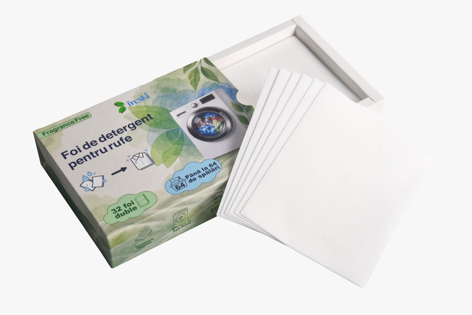 Foaie de detergent FRESKI introdusă în tamburul mașinii de spălat